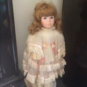 Porcelain doll with stand